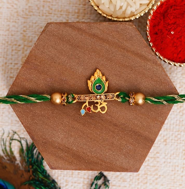 Green Om & Peacock Feather Religious Rakhi and Roli Chawal Pack